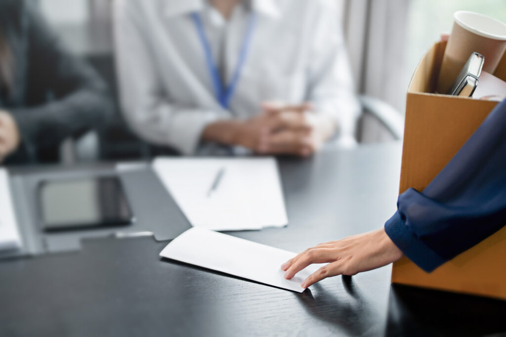 Business people breaking the contract with resignation letter staff reduction resigning leaving the office employee Resignation