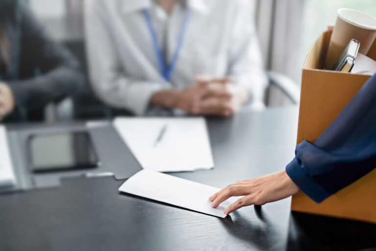 Business people breaking the contract with resignation letter staff reduction resigning leaving the office employee Resignation